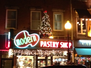 The front of Modern Pastry Shop as seen in the evening